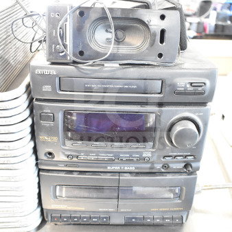 Aiwa CX-N2700U stereo system with CD player and 4 speakers. Features Super T Bass and dual cassette decks. Model NSX-2700.