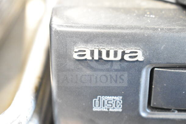 Aiwa CX-N2700U stereo system with 4 speakers, 120 volts, 1 phase. Features compact disc digital audio logo.