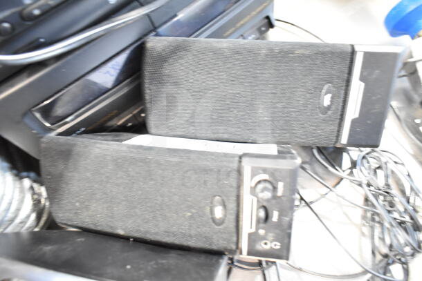 Aiwa CX-N2700U compact disc stereo system with four speakers, showing front controls and cables, in used condition.