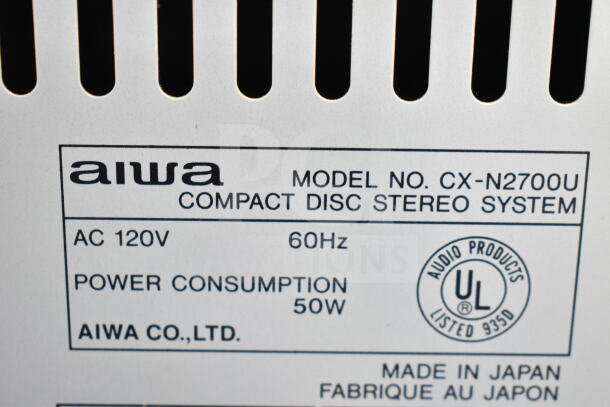 Aiwa CX-N2700U Compact Disc Stereo System label, 120V, 60Hz, 50W, made in Japan. Features UL certification.