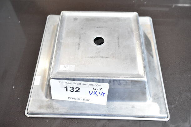 45 various sized baking pans, metal, includes auction lot tag reading "132 QTY VX45" for bidding 45 times.