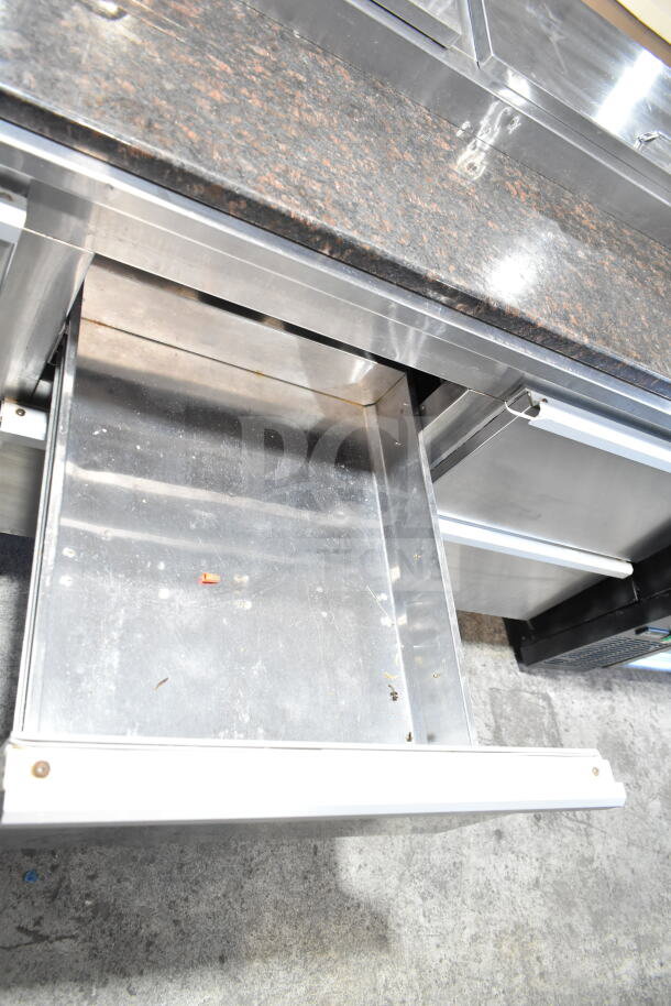 Cooltech Commercial Pizza Prep Table, granite stone cutting board, six stainless steel drawers, 120V, 1 phase, used condition.