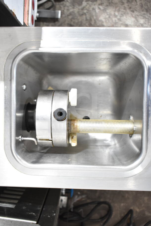 Coldelite Commercial Countertop Whipped Cream Dispenser, stainless steel, 115 volts, 1 phase; shows inner components.