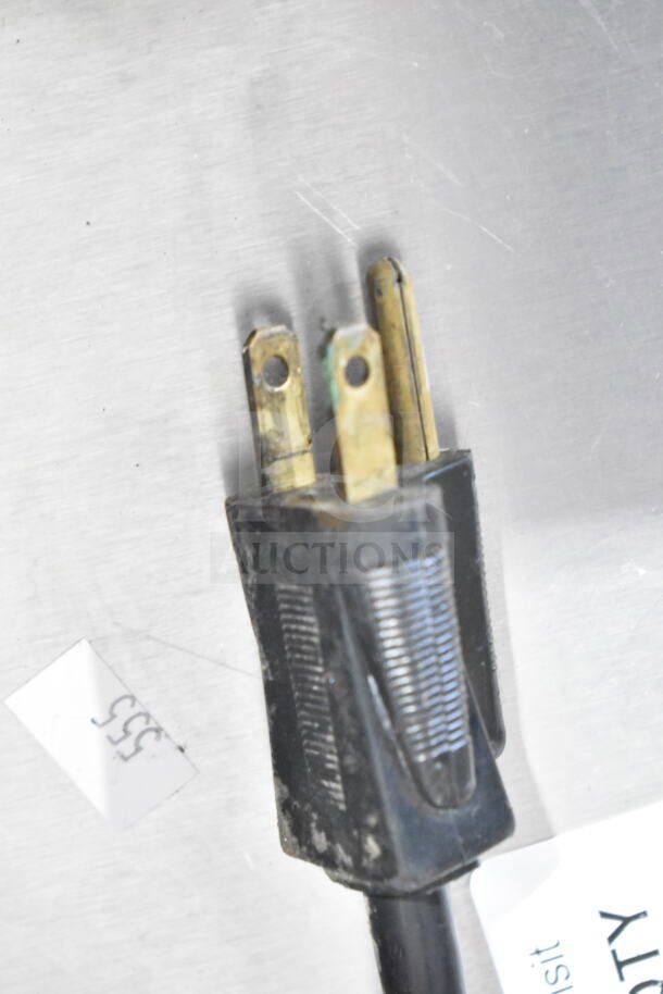 Close-up of a power plug for a Coldelite Commercial Countertop Whipped Cream Dispenser, 115 Volts, 1 Phase.