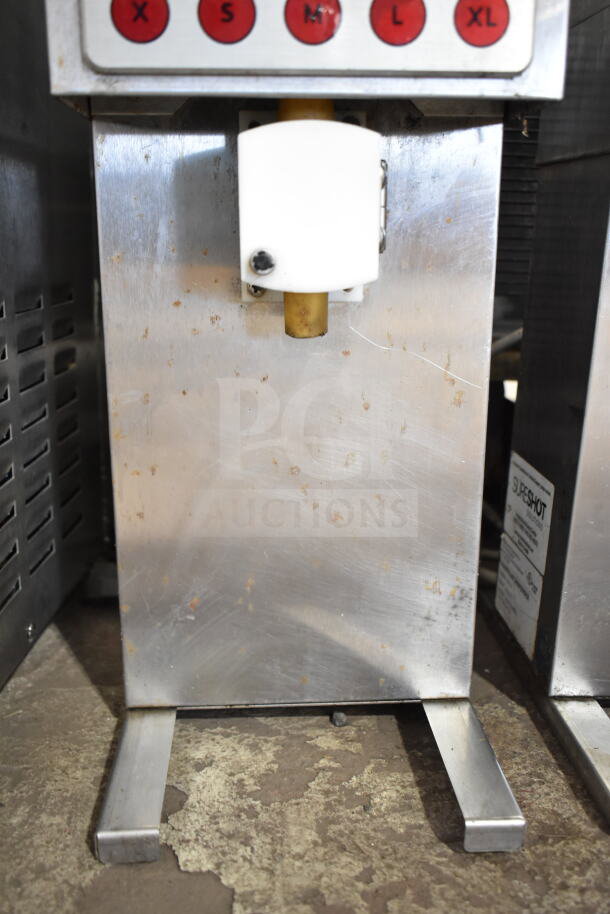 SureShot Countertop Sugar Dispenser, stainless steel, 120V, 1 Phase, used condition, visible wear and label.