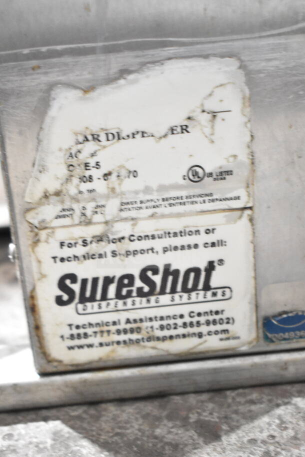 SureShot Countertop Sugar Dispenser, 120 Volts, 1 Phase. Visible label shows brand and technical support details.