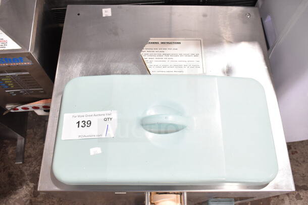 Coldelite KW 100 commercial whipped cream dispenser, 115V, 1 phase, stainless steel, used condition, with auction label.