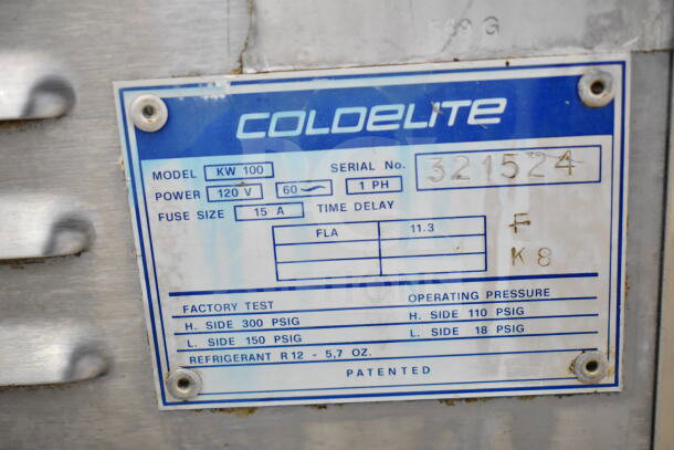 Coldelite KW 100 whipped cream dispenser label, showing model, 120V power, 15A fuse, and serial number 321524.