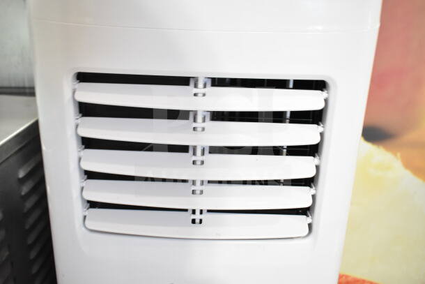 Coolblus PAC-A019K-05KR portable air conditioner, 115 volts, 1 phase, white exterior, front vent visible.