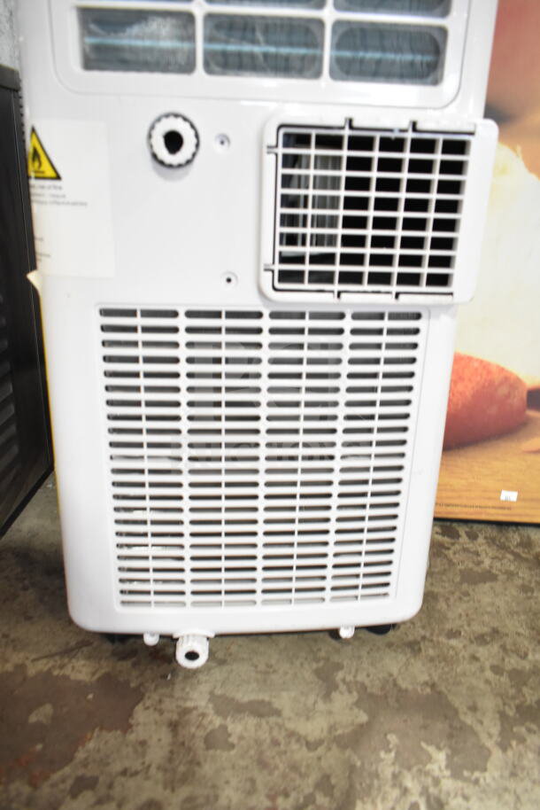 Coolblus PAC-A019K-05KR portable air conditioner, 115 volts, in good condition. Vent and control panel visible.