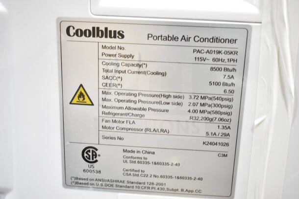 Coolblus PAC-A019K-05KR Portable Air Conditioner label showing specs: 115V, 8500 BTU cooling capacity, R32 refrigerant.