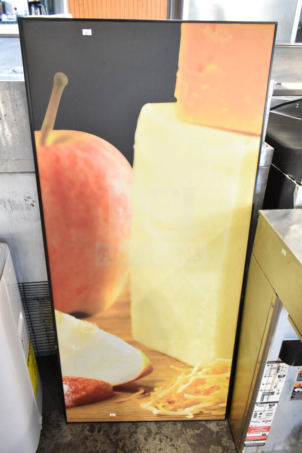 Framed picture of cheese, apples, and shredded cheese on a wooden surface. Good condition, office or kitchen decor.