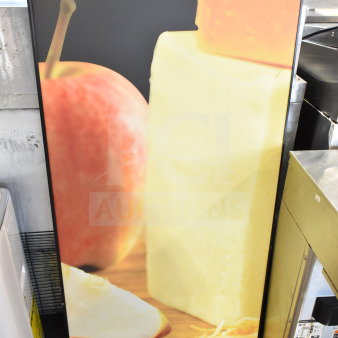Framed picture of cheese, apples, and shredded cheese on a wooden surface. Good condition, office or kitchen decor.
