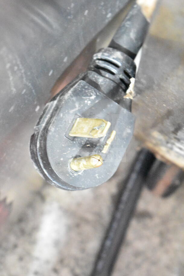 Close-up view of a three-prong plug for the Autofry MTI-40C ventless fryer, showing electrical compatibility.