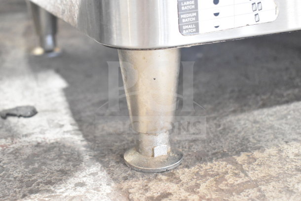 2020 Bunn ICB TWIN SH coffee machine leg, showing durable metal construction with batch settings label visible.