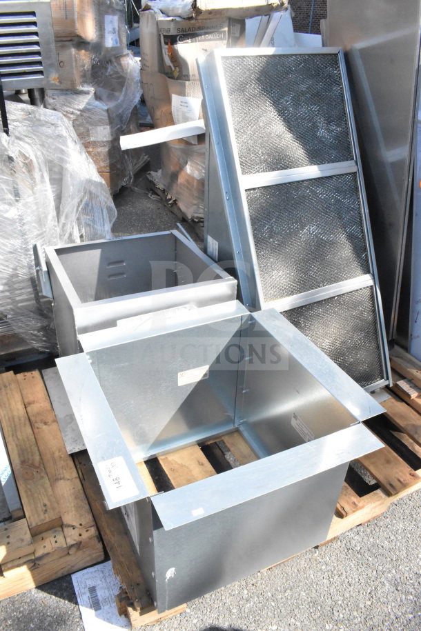 Three stainless steel items including CaptiveAire SFIH-01M hood, on pallets. Items in good condition with visible labels.