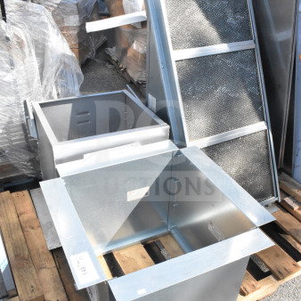 Three stainless steel items including CaptiveAire SFIH-01M hood, on pallets. Items in good condition with visible labels.