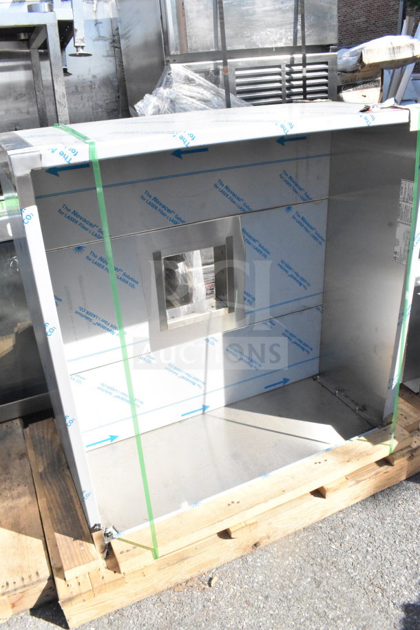 Brand new CaptiveAire 4218 VHB steam hood, 3.5', minor scratches and dents, shown on a wooden pallet, protective film visible.