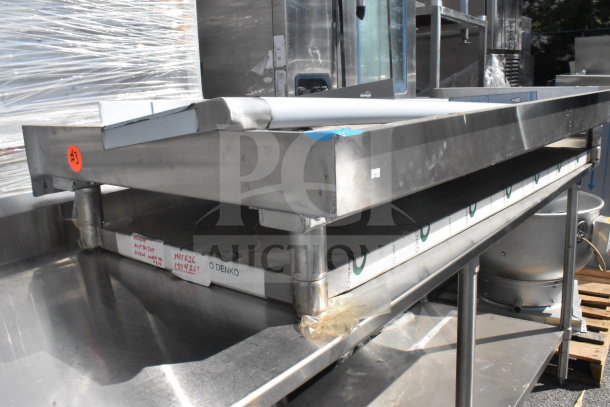 Elkay WT30S69 stainless steel shelf in good condition, featuring sturdy design with visible labels and markings.