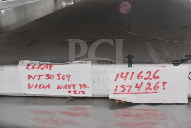 Elkay WT30S69 shelf with protective covering, visible labels indicating model and markings. New condition.
