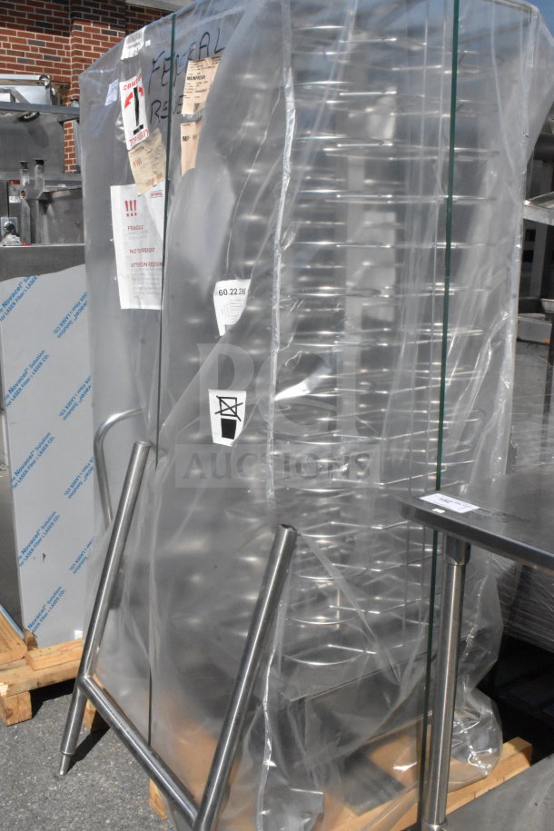 Rational HGW202 WA55 commercial roll-in rack with commercial casters, wrapped in protective plastic, displayed outdoors.