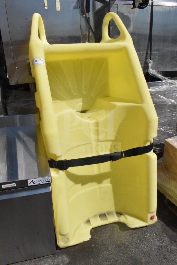 Brand new Uline H-1844 poly dolly, yellow, scratch and dent condition, durable design with a black strap for securing items.