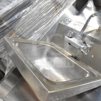 Stainless steel single bay wall mount sink with gooseneck faucet, used condition, visible wear and small dents.