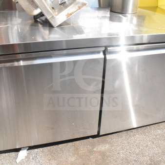 Brand new 2026 Avantco 178SSWT60RHC 60" two-door worktop refrigerator, stainless steel, 3 1/2" backsplash, minor scratches.