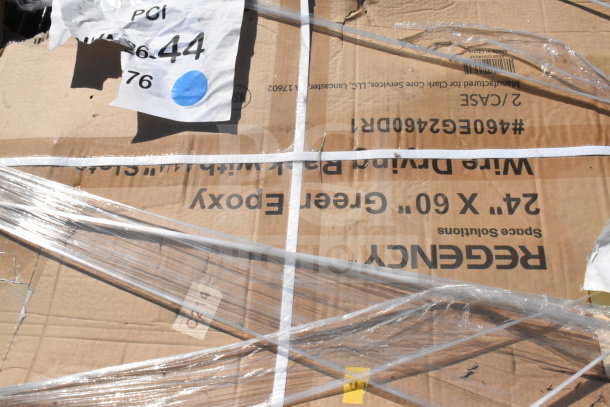 Cardboard box labeled "Regency" with plastic wrap and paper tag reading "PCI 76.44." Part of a scratch and dent auction.