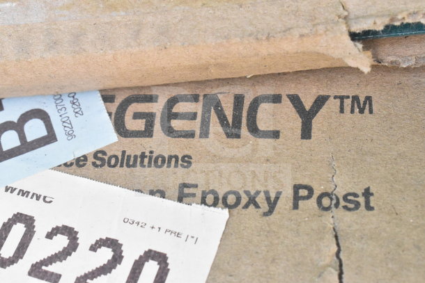 Label on cardboard packaging showing "REGENCY" brand items, part of a lot including scratch and dent furniture.
