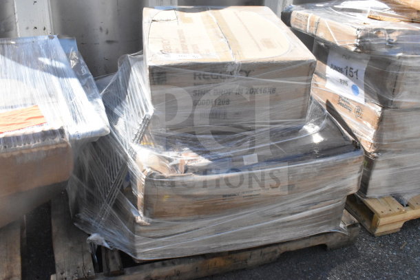 Shrink-wrapped pallet with scratch and dent items including shelves, a stool, and a cart. Regency box visible.