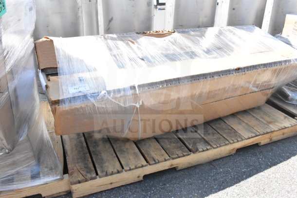 BRAND NEW Steelton 522CS31620LR three-compartment commercial sink with two 18" drainboards, wrapped and labeled.