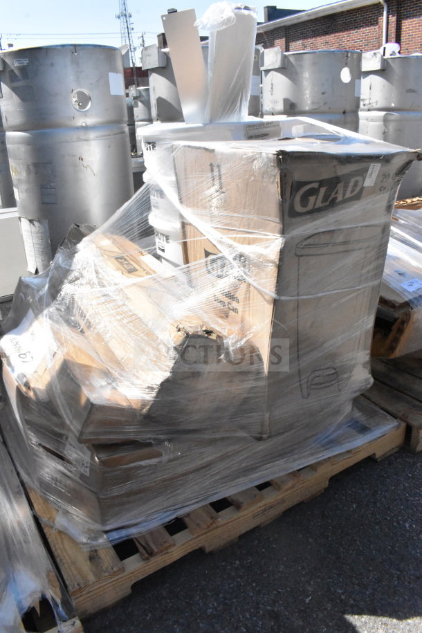 Pallet with 13 new scratch and dent items, including floor mat, table base, and rod, wrapped in plastic for auction.