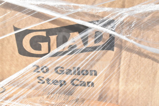 Packaged 20-gallon GLAD Step Can with protective wrap, visible brand name on cardboard, part of scratch and dent auction.