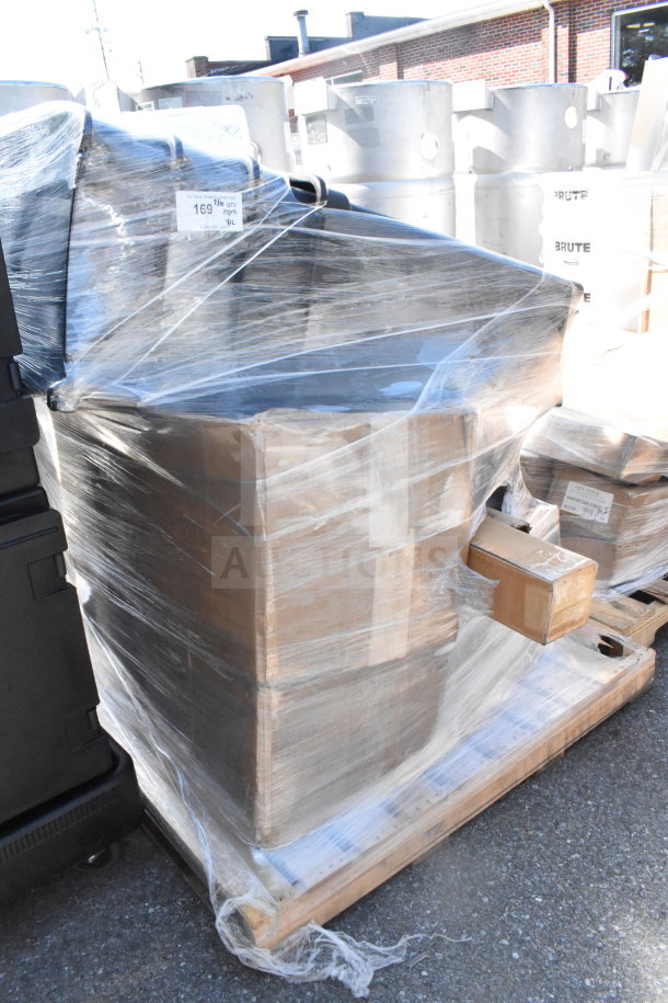 Shrink-wrapped pallet containing 12 new Scratch and Dent Black Slim Jim Trash Cans, visible labels on packaging.