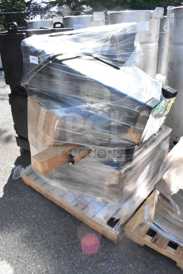 Plastic-wrapped pallet with 12 new scratch and dent items, including Black Slim Jim trash cans, auction lot.