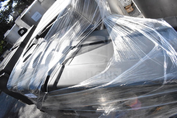 Black Slim Jim trash cans, brand new with minor scratches and dents, packaged in plastic wrap for auction. Quantity: 12.