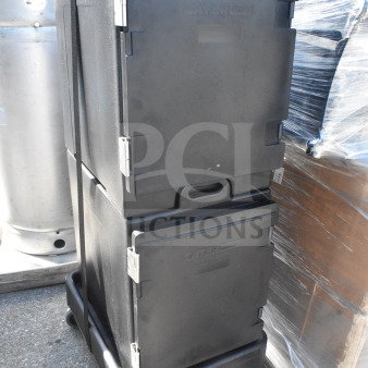 3 brand new CaterGator black insulated food pan carriers and dolly. Front loading, 5-pan capacity, 300 lb. dolly capacity.