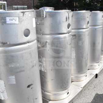 Four stainless steel Sharpsville Container tanks, weathered with visible scratches and labels, for local pickup only.
