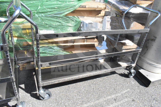 3 tier metal cart on commercial casters, polished steel, durable construction, dual handles, excellent condition.