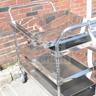 3 Tier metal cart with commercial casters, shiny finish, sturdy build, visible outdoor setting.