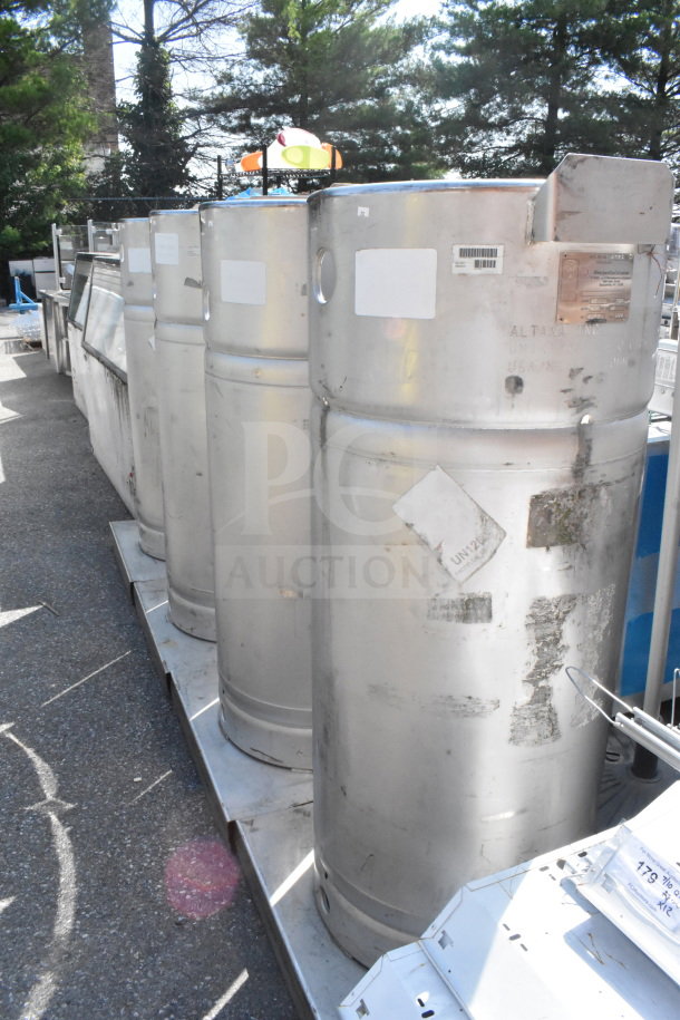 Four Sharpsville stainless steel container tanks, used condition, visible markings and wear; buyer must pick up.