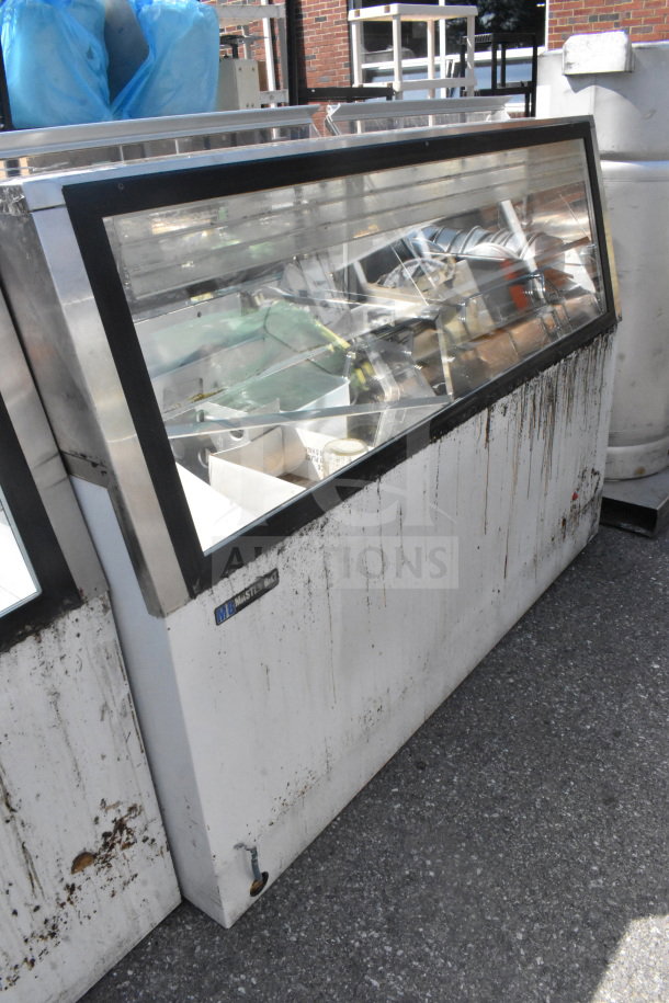 Master-Bilt commercial ice cream dipping cabinet with glass display and stainless finish. Visible wear and rust marks.