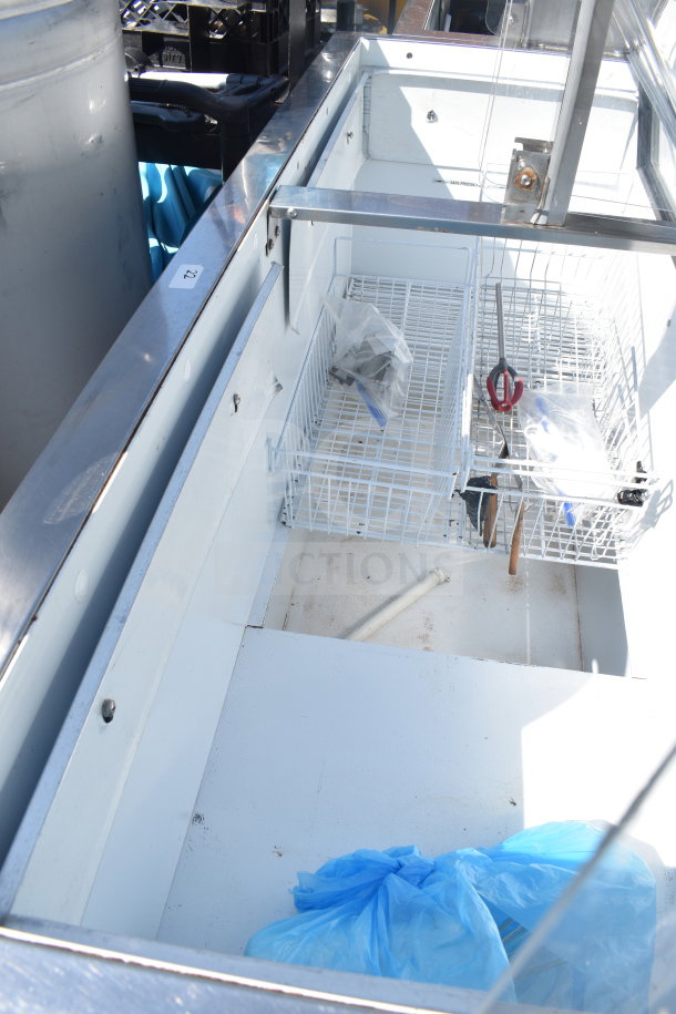 Master-Bilt Commercial Ice Cream Dipping Cabinet, white interior, wire basket, used condition, metal exterior.