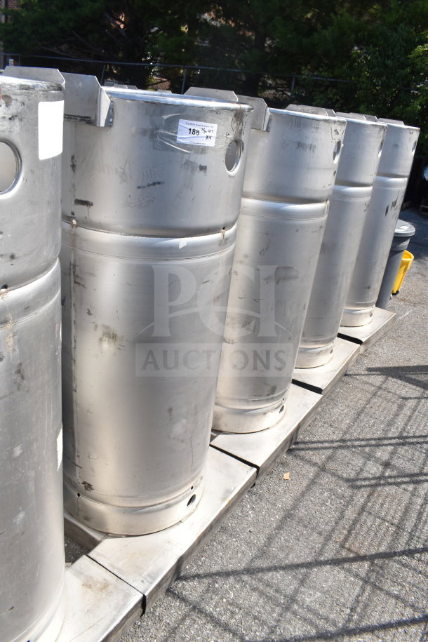 Four Sharpsville container tanks, metal, cylindrical, used condition, visible label indicates item quantity. Buyer pickup required.