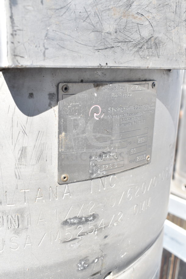Sharpsville Container tank, metal surface with visible scratches, labeling includes manufacturer, pressure, and year 2009. Buyer pickup only.