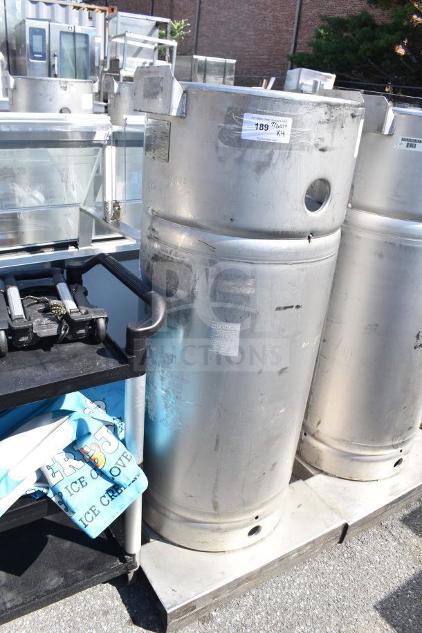 4 Sharpsville Container Tanks in stainless steel with visible wear, numbered tags indicating auction lot, buyers must pick up.