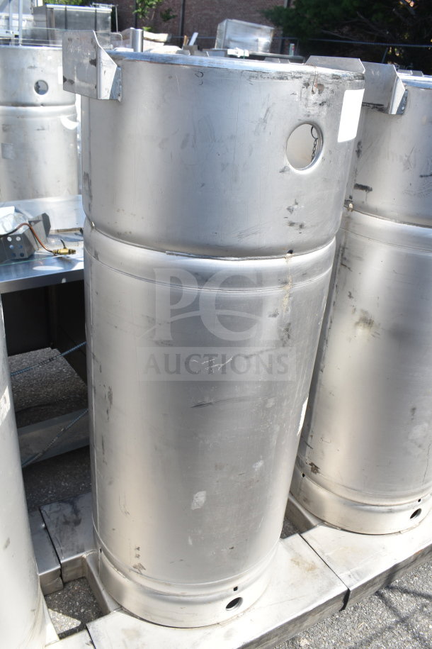 4 Sharpsville Container tanks in metal, cylindrical design. Used condition with visible wear marks. Buyer must pick up.