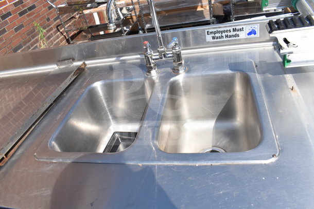 Commercial counter with 2-bay sink, stainless steel, 4 doors. "Employees Must Wash Hands" sign visible. Good condition.