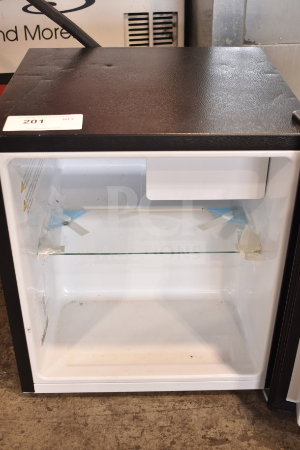 Hisense 32KHS310986 Mini Cooler, 115 Volts, 1 Phase, in gently used condition. Auction tag 201 visible on the top.